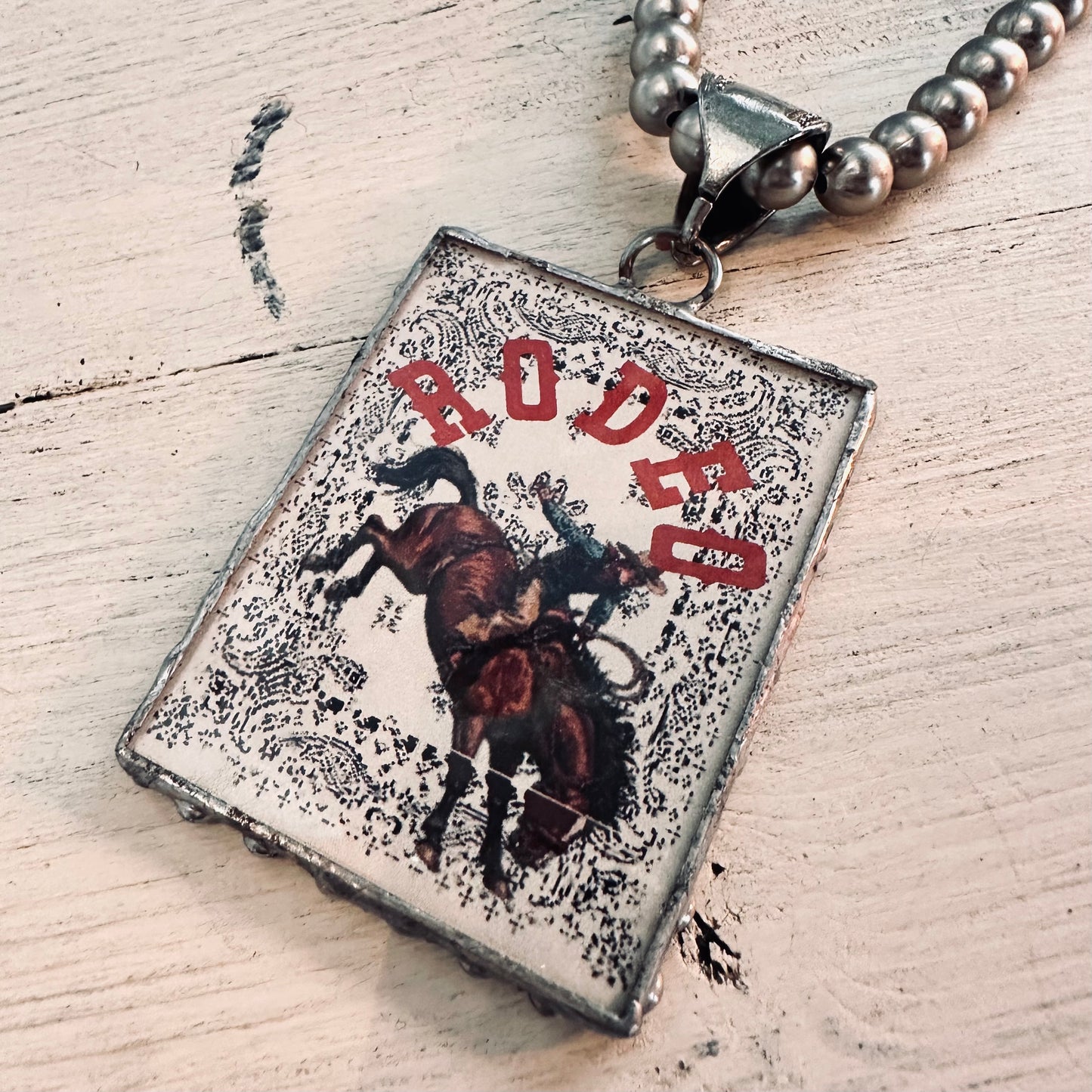 8mm Pewter Pearl Necklace with Rodeo Buckin Horse Pendant