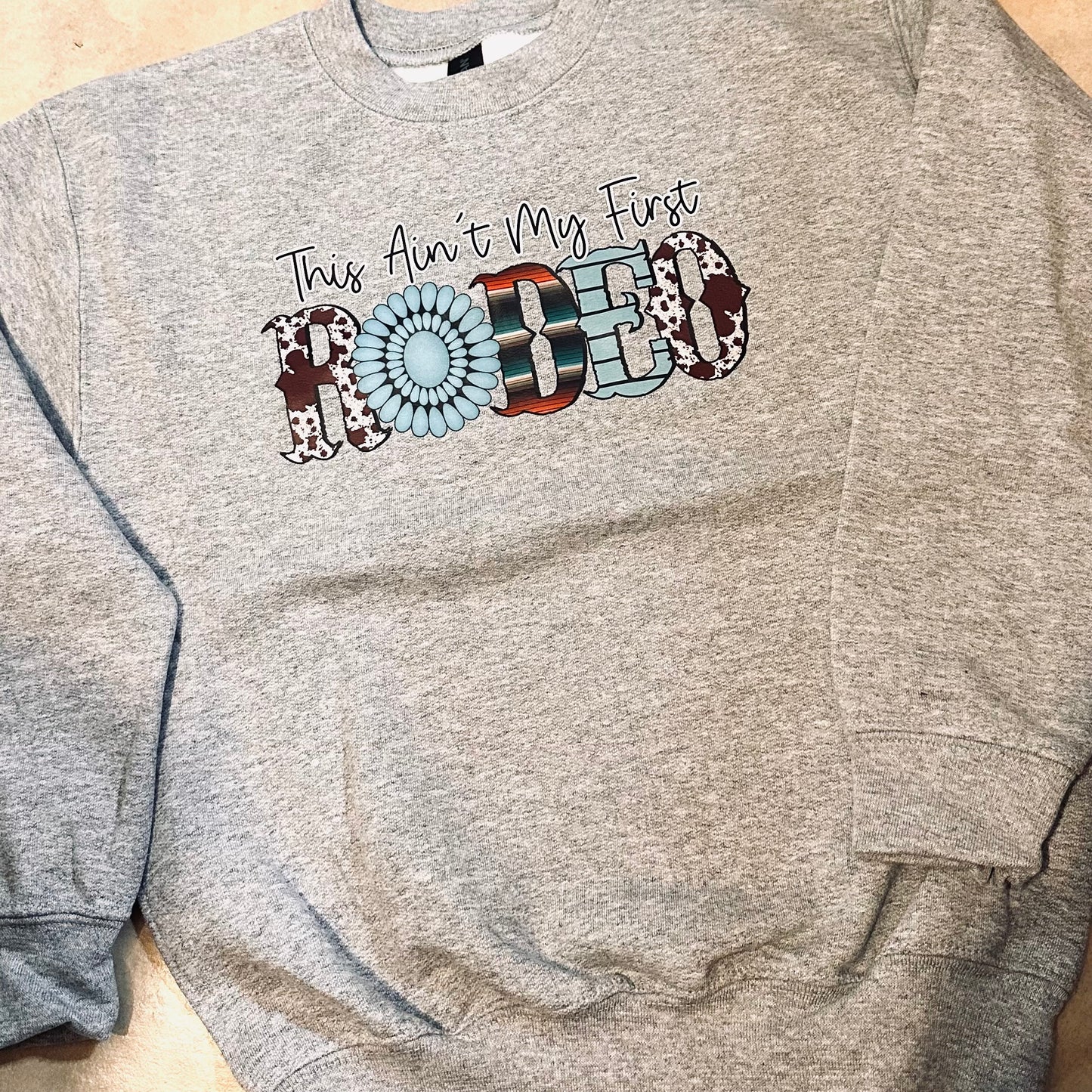 Youth "This Aint My First Rodeo" Sweatshirt