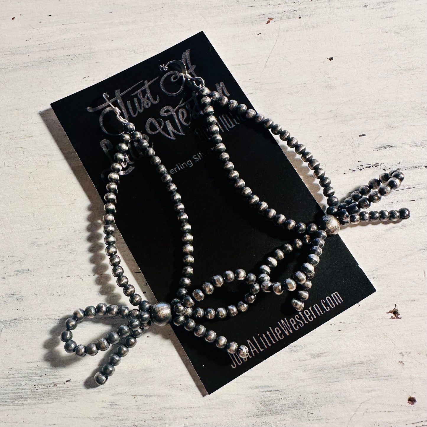 Sterling Navajo Teardrop & Bow Earring