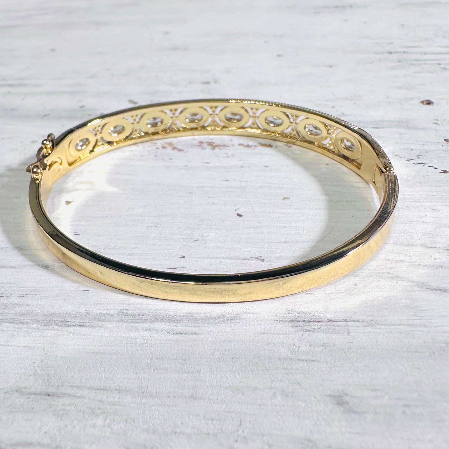 Gold Filagree Oval Rhinestone Hinge Bangle