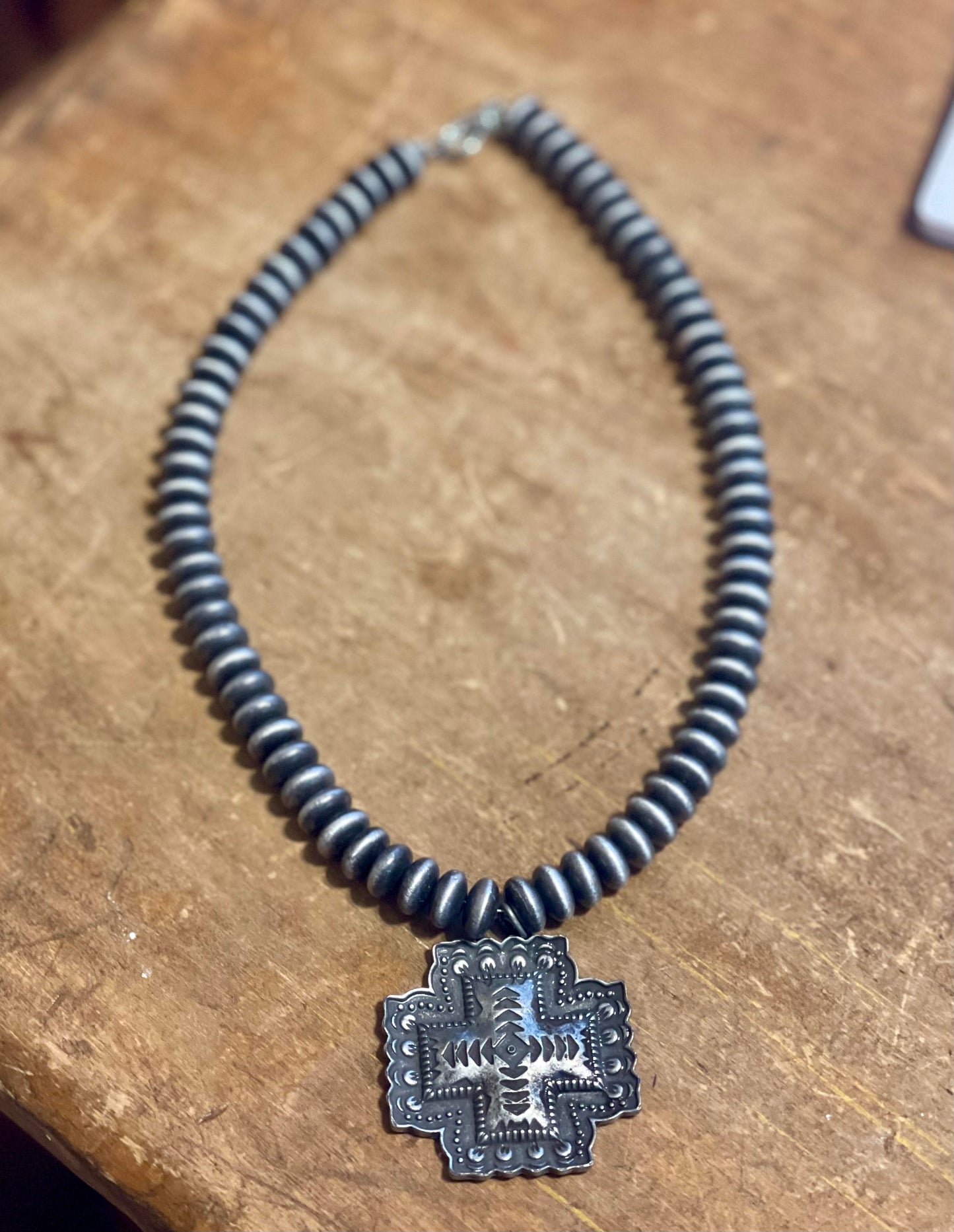 Saucer Bead Necklace with Aztec Cross