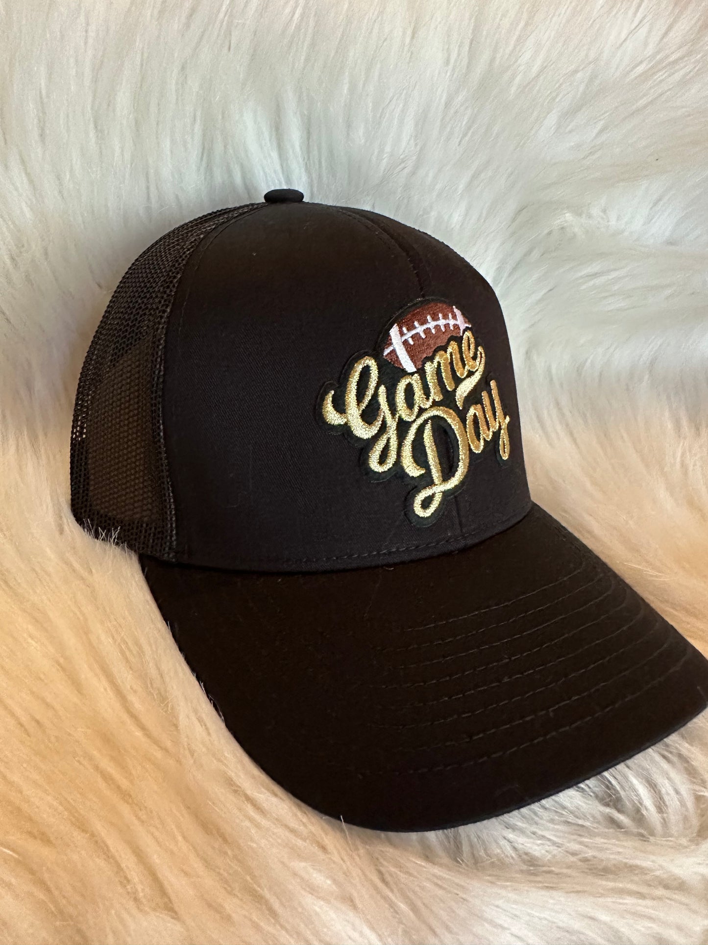 Black Trucker Cap with Gold Game Day Patch