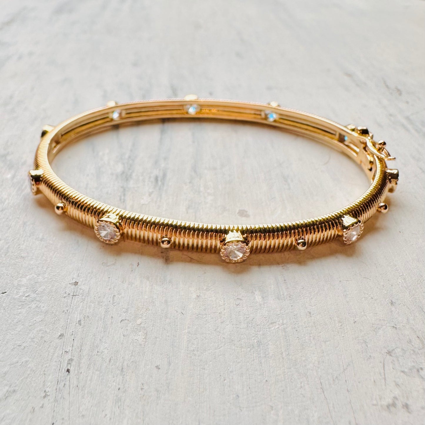 Gold Ribbed Bangle with CZ Stones