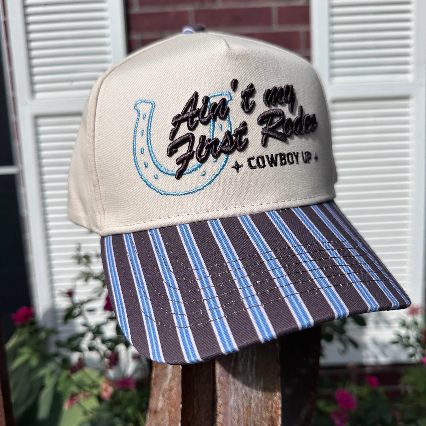 Ain't My First Rodeo Chocolate Striped Trucker Cap