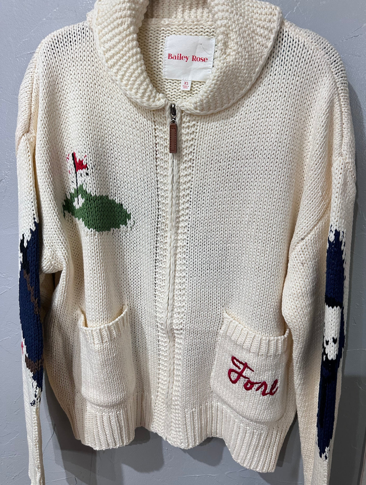 Cream Golf Themed Zip Up Sweater