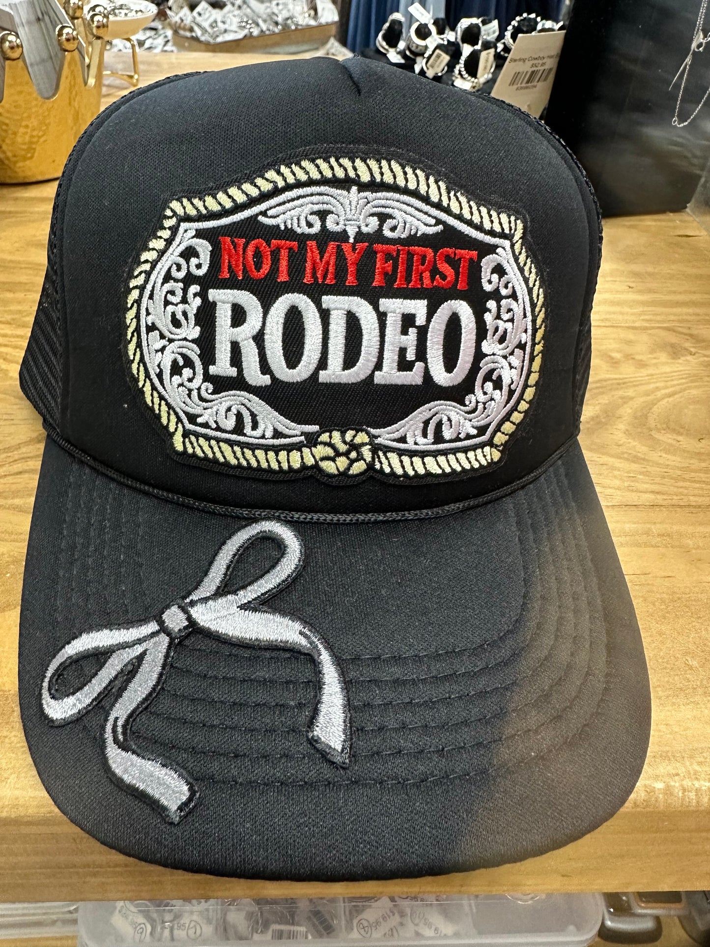 Not My First Rodeo Black Trucker Cap