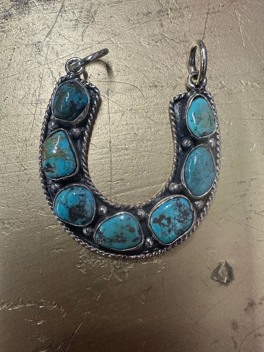 Turquoise Seven Stone Horseshoe Pendant with double bell